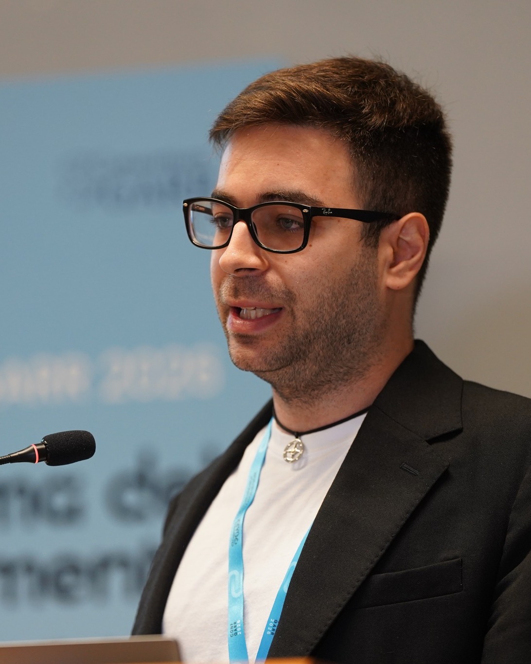 Giuseppe speaking at a public quantum technology event