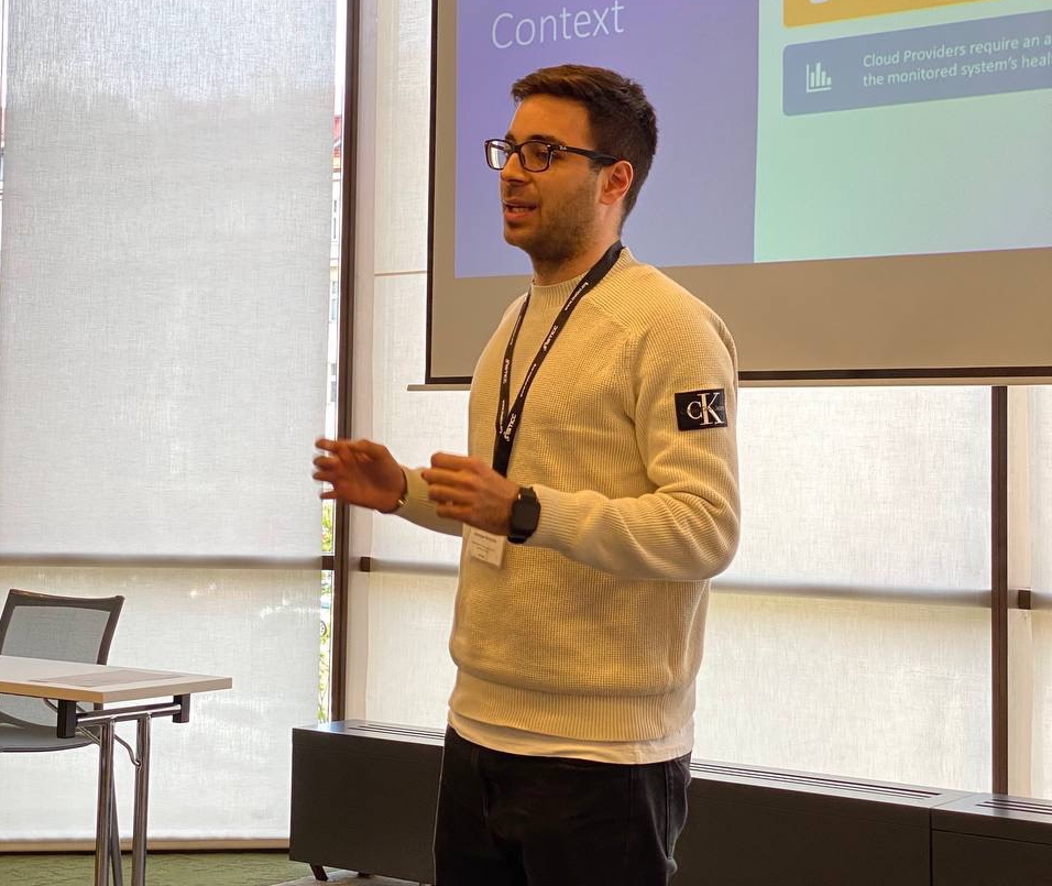 Giuseppe discussing a software architecture diagram